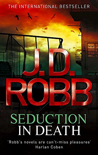 Book cover for Seduction in Death by J.D. Robb featuring a dark, stormy sky.