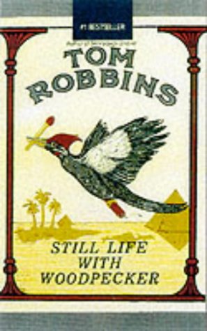 Book cover for Still Life With Woodpecker by Tom Robbins featuring a flying woodpecker.