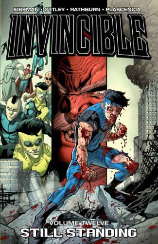 Invincible Volume 12 cover: injured superhero amidst city destruction.