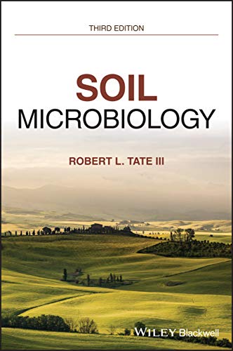 Book cover for "Soil Microbiology" with a landscape background.