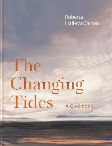 Cookbook cover: "The Changing Tides" with ocean wave background.