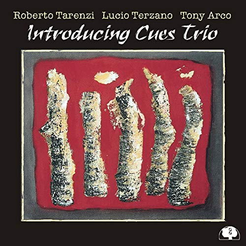 CD cover: abstract red background with vertical, textured shapes.
