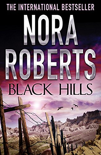 Book cover for Black Hills by Nora Roberts featuring a rugged, mountainous landscape.