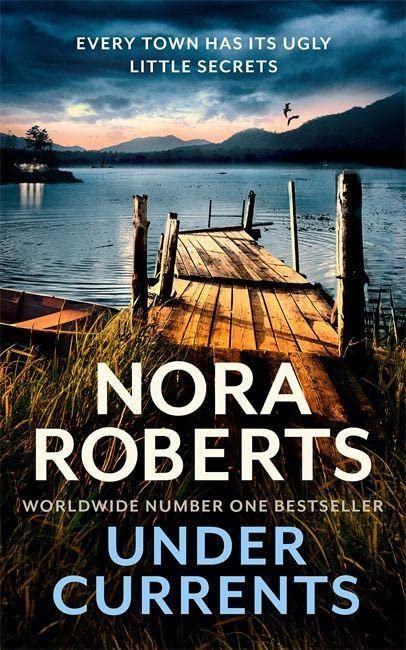 Book cover: lake scene, broken dock, and large text “Under Currents” by Nora Roberts.