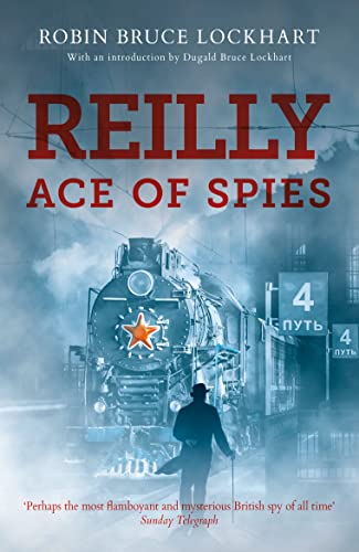 Book cover: “Reilly Ace of Spies” with a train and figure in shadow.