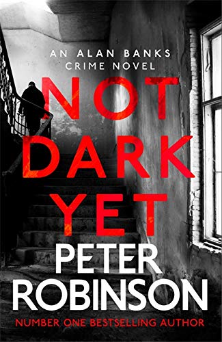 Book cover: "Not Dark Yet" with a figure on a staircase.
