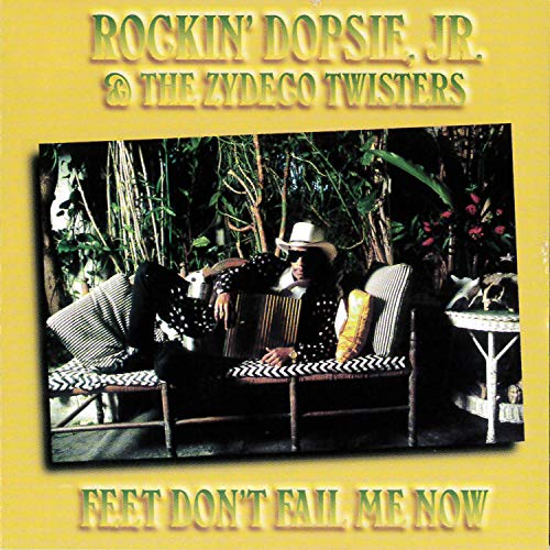 CD cover: Rockin' Dopsie Jr. relaxing with an accordion outdoors.