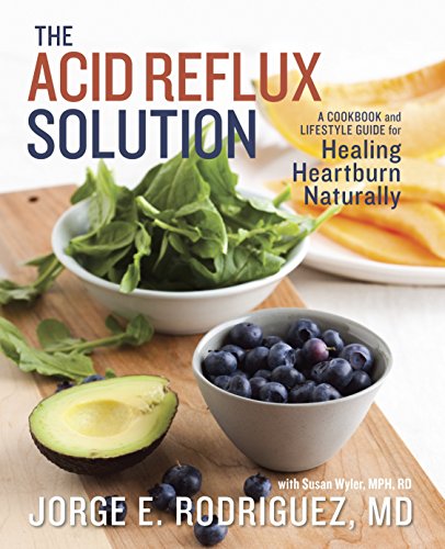 Book cover featuring healthy foods: blueberries, avocado, and leafy greens.