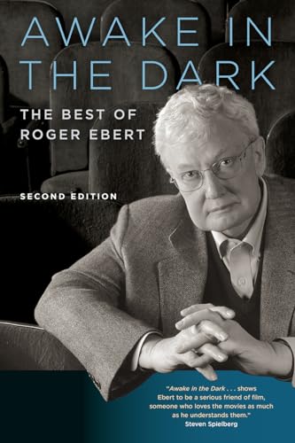 Book cover featuring film critic Roger Ebert in a movie theater.