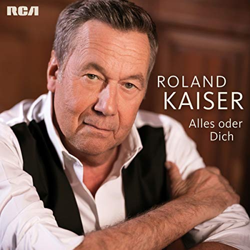 Roland Kaiser album cover, portrait of a graying man in a vest.