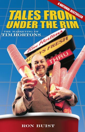 Book cover featuring Tim Hortons founder with donuts and a drive-thru sign.