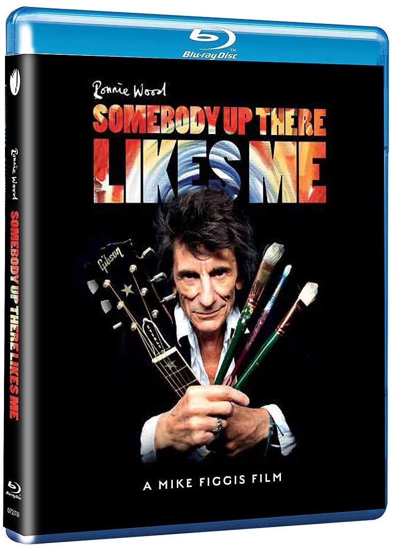 Blu-ray cover featuring Ronnie Wood holding paintbrushes and a guitar headstock.