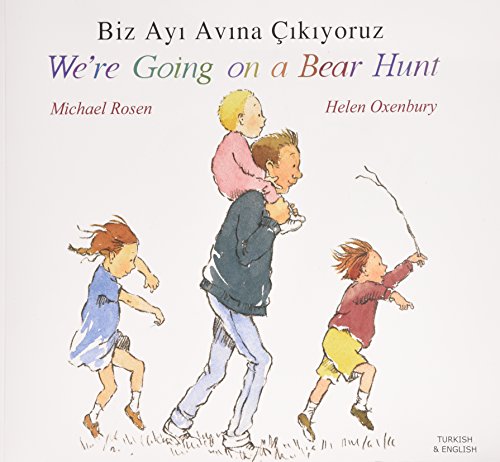 Children and father illustrated on cover of bilingual "Bear Hunt" book.