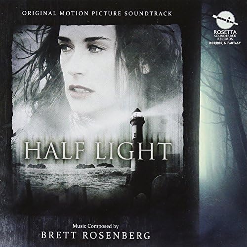 CD cover for "Half Light" featuring a woman and a coastal lighthouse.