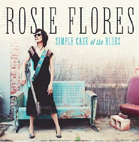Rosie Flores album cover: woman in black dress with guitar, standing by a blue bench.