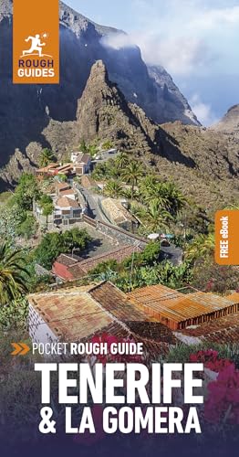 Travel guide cover featuring a mountainous landscape and village rooftops.