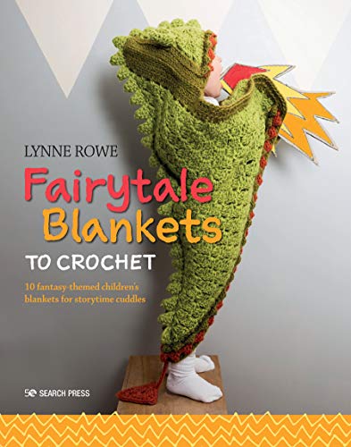 A child wears a green crocheted dragon blanket with a flame cutout.