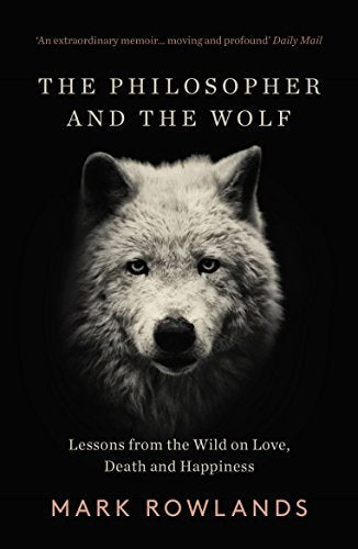 Book cover: a wolf’s face over a dark background, title “The Philosopher and the Wolf.”