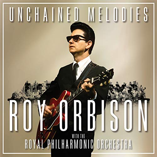 Roy Orbison album cover featuring him with a guitar and orchestra.