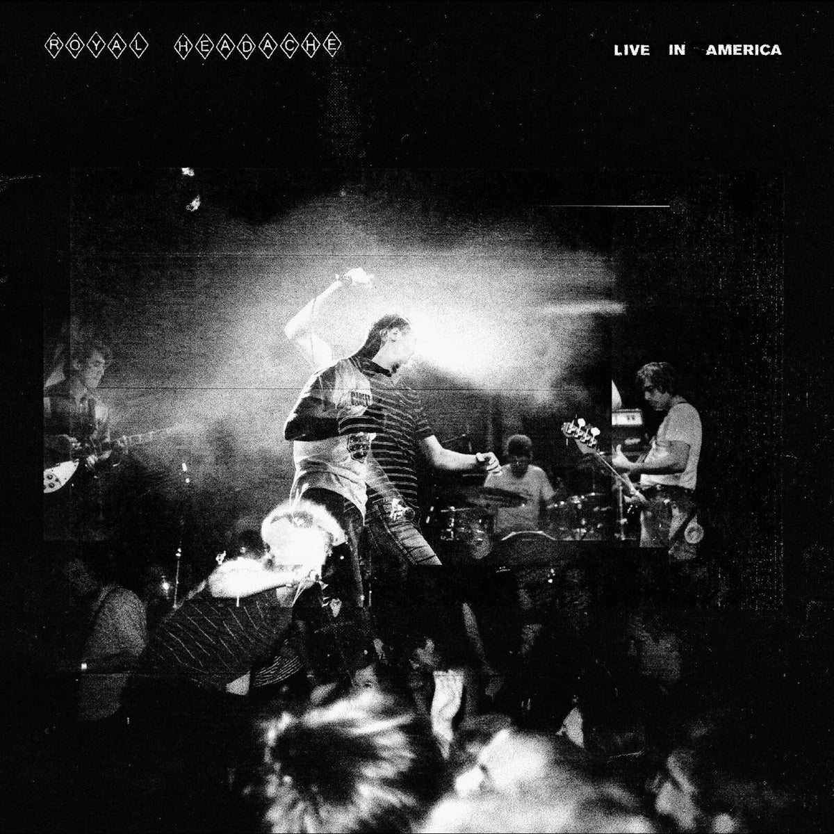 Black and white concert photo of Royal Headache performing live.