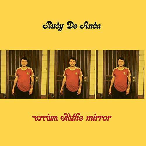 Vinyl record cover featuring a man repeated in mirrored doorways.
