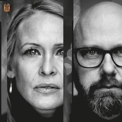 Black and white portrait of two people, a woman and a man.