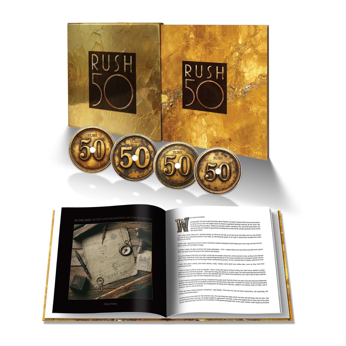Four CDs in a deluxe case with Rush's logo and album artwork prominently displayed.