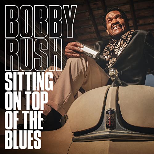 Bobby Rush album cover: man sitting on a vintage car hood.