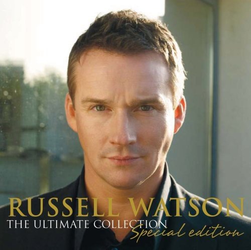 Russell Watson portrait on CD cover, with gold text and blurred background.