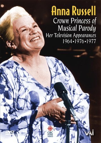 Anna Russell, smiling and singing into a microphone on DVD cover.