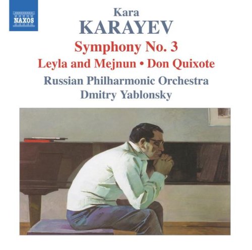 "CD cover with a man sitting by a piano, head in hands."
