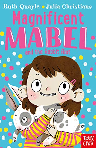 A young girl with brown hair wearing a striped sweater holds a white rabbit.