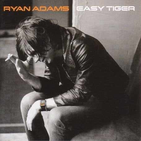Ryan Adams album cover, black and white portrait of a man in a jacket.