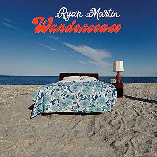 Album cover: bed on a beach under a blue sky with clouds.
