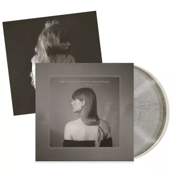 Taylor Swift The Tortured Poets Department Anthology vinyl record with cover art and disc.