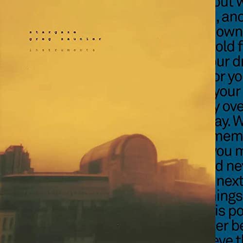 Vinyl record cover with a sunset and silhouetted building.