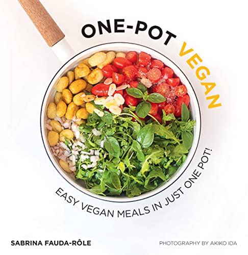 Book cover showing a pot of gnocchi, cherry tomatoes, and fresh green herbs.