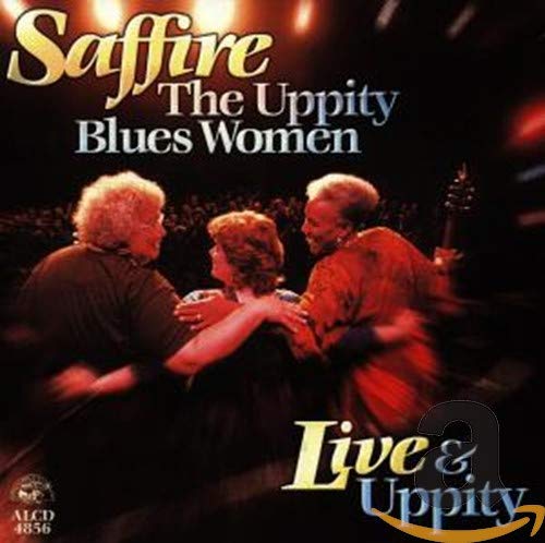 CD cover featuring three women with blonde hair performing onstage.
