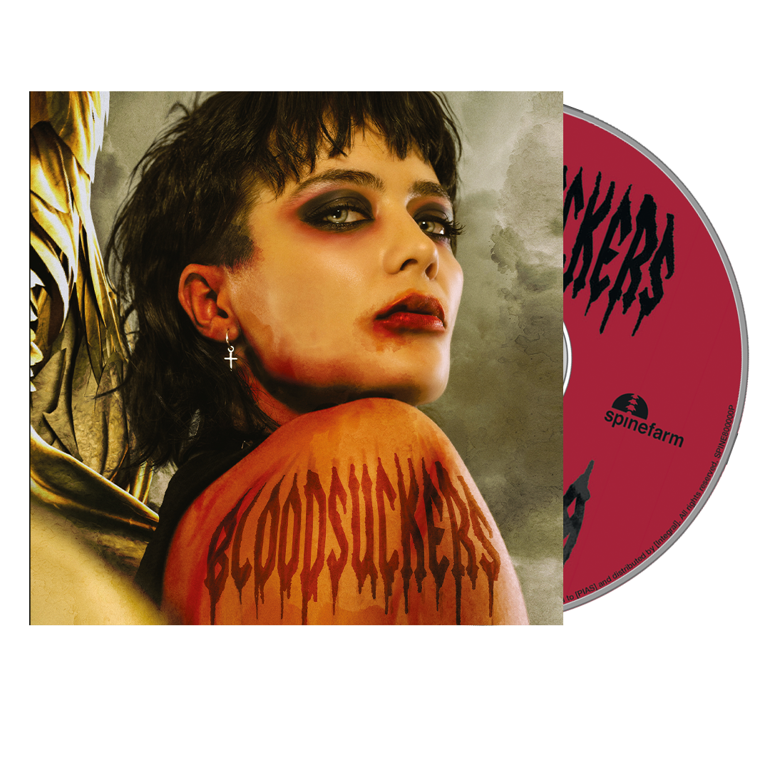 CD case featuring a woman with dramatic makeup and blood-like imagery.