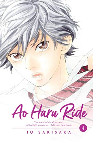 Manga cover featuring a close-up of a young man with messy hair and tie.