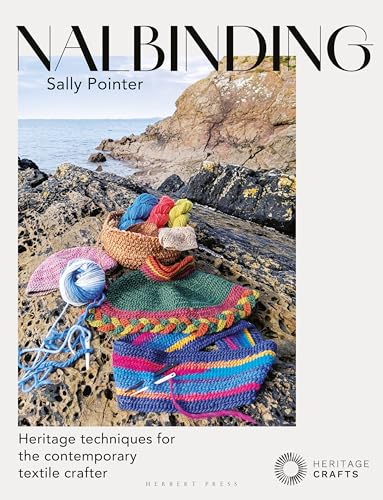 Book cover showing colorful nalbound textiles and yarn on a rocky coastal shore.