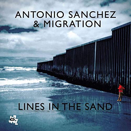 CD cover: beach, wall, and a lone figure in red.