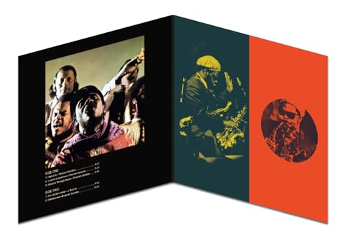 Open vinyl record gatefold featuring portraits of musicians in warm tones.