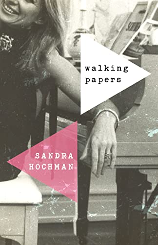Book cover with a woman’s arm and geometric pink and white shapes.