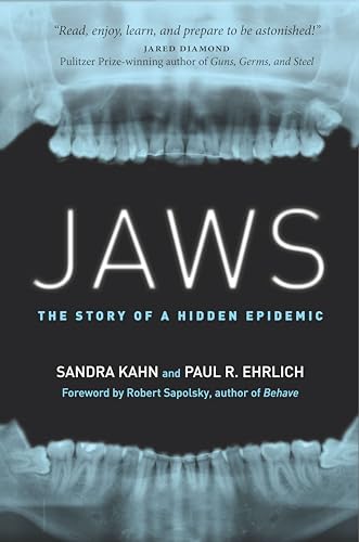 Book cover featuring a dental X-ray of upper and lower jaws on black background.