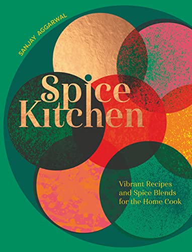 Cookbook cover with overlapping colorful circles and bold "Spice Kitchen" title.
