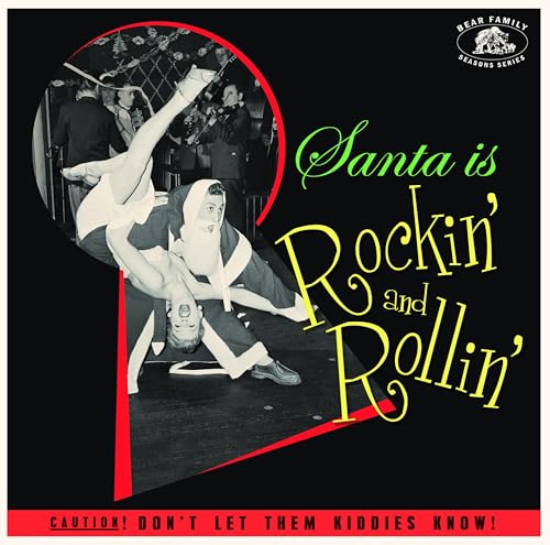 CD cover: Santa Claus rock and rolls with a performer in a band.