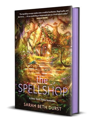 Book cover for āThe Spellshopā depicts a whimsical cottage in a garden.