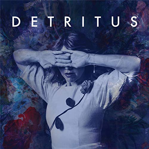Album cover for Sarah Neufeld’s “Detritus” featuring a woman with flowers.