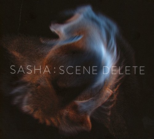 Album cover with abstract blue and orange light streaks against a dark background.